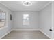 Bright, airy bedroom with neutral walls, updated flooring, and two windows at 708 Bobby L. Davis Blvd., Marion, SC 29571