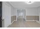 Bright hallway with light gray walls, and light colored vinyl plank floors at 708 Bobby L. Davis Blvd., Marion, SC 29571