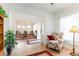 Inviting living room showcasing hardwood floors and a seamless transition into the dining area at 818 Mourning Dove Dr., Myrtle Beach, SC 29577