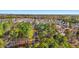 An aerial view of the community with ponds and tree-lined streets at 950 Forestbrook Rd. # A2, Myrtle Beach, SC 29579