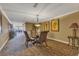 Welcoming common room featuring dining table with seating and access to game room at 9547 Edgerton Dr. # Ph1005, Myrtle Beach, SC 29572
