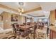 Open-concept dining room with a large table and chandelier at 9547 Edgerton Dr. # Ph1005, Myrtle Beach, SC 29572