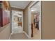 Hallway leading to a bathroom with a soaking tub and a walk-in closet at 9547 Edgerton Dr. # Ph1005, Myrtle Beach, SC 29572