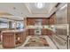Kitchen with stainless steel appliances, granite countertops, island, and tile floors at 9547 Edgerton Dr. # Ph1005, Myrtle Beach, SC 29572