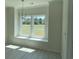 Charming dining area with large window, decorative lighting, and comfortable window seating at 994 Oak Hollow St., Longs, SC 29568