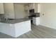 Modern kitchen featuring granite countertops, stainless steel appliances, and ample storage space at 994 Oak Hollow St., Longs, SC 29568