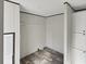 Walk-in closet with wood-style flooring and white shelving for organized storage at 1455 Francis Marion Dr., Georgetown, SC 29440