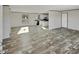 Large living room with lots of natural light featuring wood-look floors and an open floor plan at 1455 Francis Marion Dr., Georgetown, SC 29440