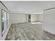 Spacious living room featuring wood floors, neutral wall color, and natural light at Francis Marion Dr., Georgetown, SC 29440