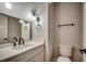 Stylish bathroom features a modern vanity, black fixtures, a large mirror, and neutral paint at 1007 Brood Ct., Conway, SC 29526