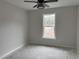 Cozy bedroom with a modern ceiling fan and a window letting in natural light at 1007 Brood Ct., Conway, SC 29526