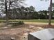 Backyard view of a golf course with mature trees providing shade and privacy at 1007 Brood Ct., Conway, SC 29526