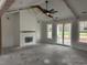 Open-concept living room features vaulted ceilings and a cozy fireplace at 1007 Brood Ct., Conway, SC 29526