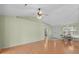 Bright, open-concept living room featuring hardwood floors and access to the dining area at 1021 Dunraven Ct., Conway, SC 29527
