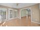 Bright sunroom featuring natural light, a ceiling fan, and a view into the main living space at 1021 Dunraven Ct., Conway, SC 29527