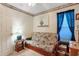 Bedroom with a futon, side table with lamp, and closet at 1061 Courtyard Dr., Conway, SC 29526