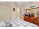 Bedroom with a TV on a dresser, closet, and access to the Primary bathroom at 1061 Courtyard Dr., Conway, SC 29526