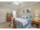 Serene bedroom with a blue and white bedding, soft natural light, and tasteful decor at 1061 Courtyard Dr., Conway, SC 29526