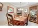 Elegant dining room with traditional furniture, decorative lighting, and built-in display cabinet at 1061 Courtyard Dr., Conway, SC 29526