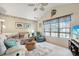 Comfortable living room with natural light, neutral tones, plush seating, and a decorative rug at 1061 Courtyard Dr., Conway, SC 29526