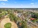 Aerial view showcasing the home's location near a golf course, offering stunning views and recreational opportunities at 109 Clemson Rd., Conway, SC 29526