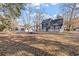 Exterior photo of the backyard featuring an outdoor deck and fire pit at 109 Clemson Rd., Conway, SC 29526