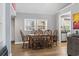 Inviting dining room with hardwood floors and natural light, adjacent to the kitchen for easy access at 109 Clemson Rd., Conway, SC 29526