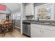 Well-lit kitchen featuring granite countertops, stainless steel appliances, and a dining area perfect for Gathering meals at 109 Clemson Rd., Conway, SC 29526