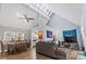 Open-concept living room with vaulted ceilings, plentiful natural light, and a view to the dining area at 109 Clemson Rd., Conway, SC 29526