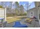 Backyard featuring a patio with outdoor seating, a playset, and a well-maintained lawn at 109 Jessica Lakes Dr., Conway, SC 29526