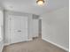Bedroom with neutral carpet, closet, and a large window offering plenty of natural light at 1091 Forest Bend Dr., Calabash, NC 28467