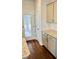 Well-lit kitchen showcasing granite countertops, tile backsplash, and wood flooring at 1091 Forest Bend Dr., Calabash, NC 28467
