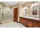 This bathroom features double sink vanities, a walk-in shower and tile flooring at 1110 Links Rd., Myrtle Beach, SC 29575