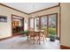 Charming dining area filled with natural light featuring a modern chandelier and cozy table at 1110 Links Rd., Myrtle Beach, SC 29575