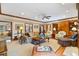 Large living room featuring hardwood floors, comfortable seating, built-in shelving, and natural light at 1110 Links Rd., Myrtle Beach, SC 29575