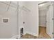 Functional laundry room with washer/dryer hookups and tile flooring at 1111 Forest Bend Dr., Calabash, NC 28467