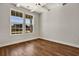 Living room featuring hardwood floors, natural light, and neutral paint at 1111 Forest Bend Dr., Calabash, NC 28467