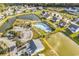 Aerial view of community featuring pool, lake, and playground at 1166 Bethpage Dr., Myrtle Beach, SC 29579