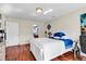 Bright bedroom featuring hardwood floors and a white wood bed frame at 1166 Bethpage Dr., Myrtle Beach, SC 29579