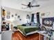 Bedroom featuring hardwood floors, fan, a window and decorated with personal items at 1166 Bethpage Dr., Myrtle Beach, SC 29579