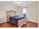 Bedroom featuring hardwood floors, a window and neutral color scheme at 1166 Bethpage Dr., Myrtle Beach, SC 29579