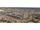 Aerial view showcasing the condo's prime location near ponds, shopping, and neighborhood homes at 117 Ella Kinley Circle # 302, Myrtle Beach, SC 29588