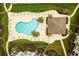 An aerial view of the community pool, lounge area, and surrounding landscaping at 117 Ella Kinley Circle # 302, Myrtle Beach, SC 29588