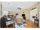 Inviting living room with hardwood floors, comfortable seating, and a view into the kitchen at 117 Ella Kinley Circle # 302, Myrtle Beach, SC 29588