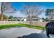 Serene backyard featuring well-kept lawn, a privacy fence, and inviting outdoor space at 1205 Formby Ct., Myrtle Beach, SC 29588