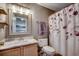 Well-maintained bathroom features a vanity with marble countertop and a shower at 1205 Formby Ct., Myrtle Beach, SC 29588