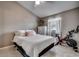 Bedroom with a large bed, neutral tones, and exercise bike at 1205 Formby Ct., Myrtle Beach, SC 29588