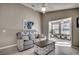 Comfortable living room featuring a gray sofa, stylish coffee table, and view to the sunroom at 1205 Formby Ct., Myrtle Beach, SC 29588