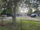 Property with a grassy yard, multiple outbuildings, and a driveway at 127 Nu-Shell St, Georgetown, SC 29440