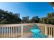 A balcony view of the beautiful waterfront with comfortable seating to enjoy the outdoors at 129 Hartland Dr. # 8-I, Myrtle Beach, SC 29572